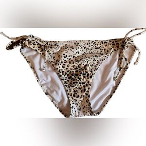 Leopard Print Bikini Bottoms with side ties. Women’s size Medium.
